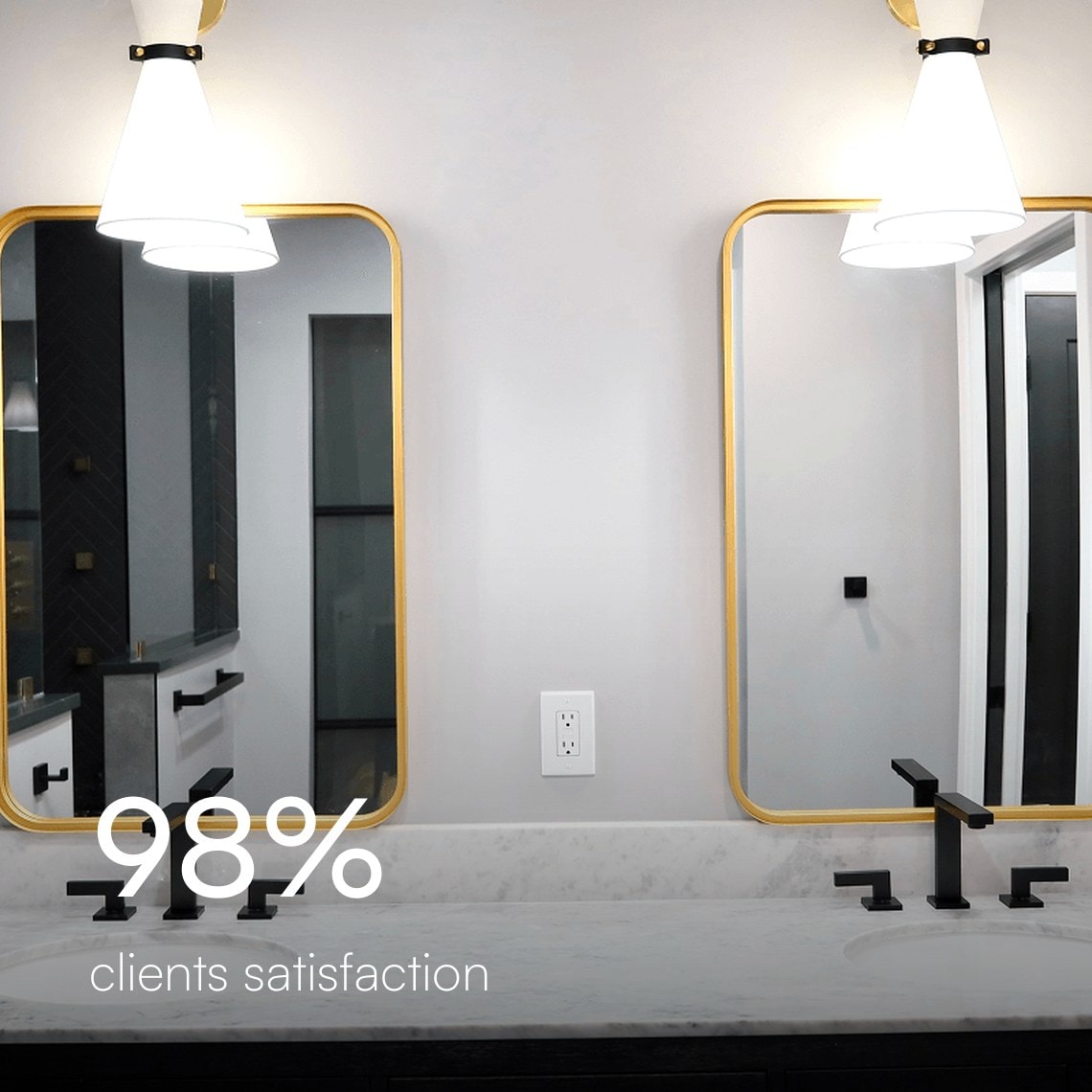 Custom double vanity with brass-framed mirrors and pendant lights, 98% client satisfaction